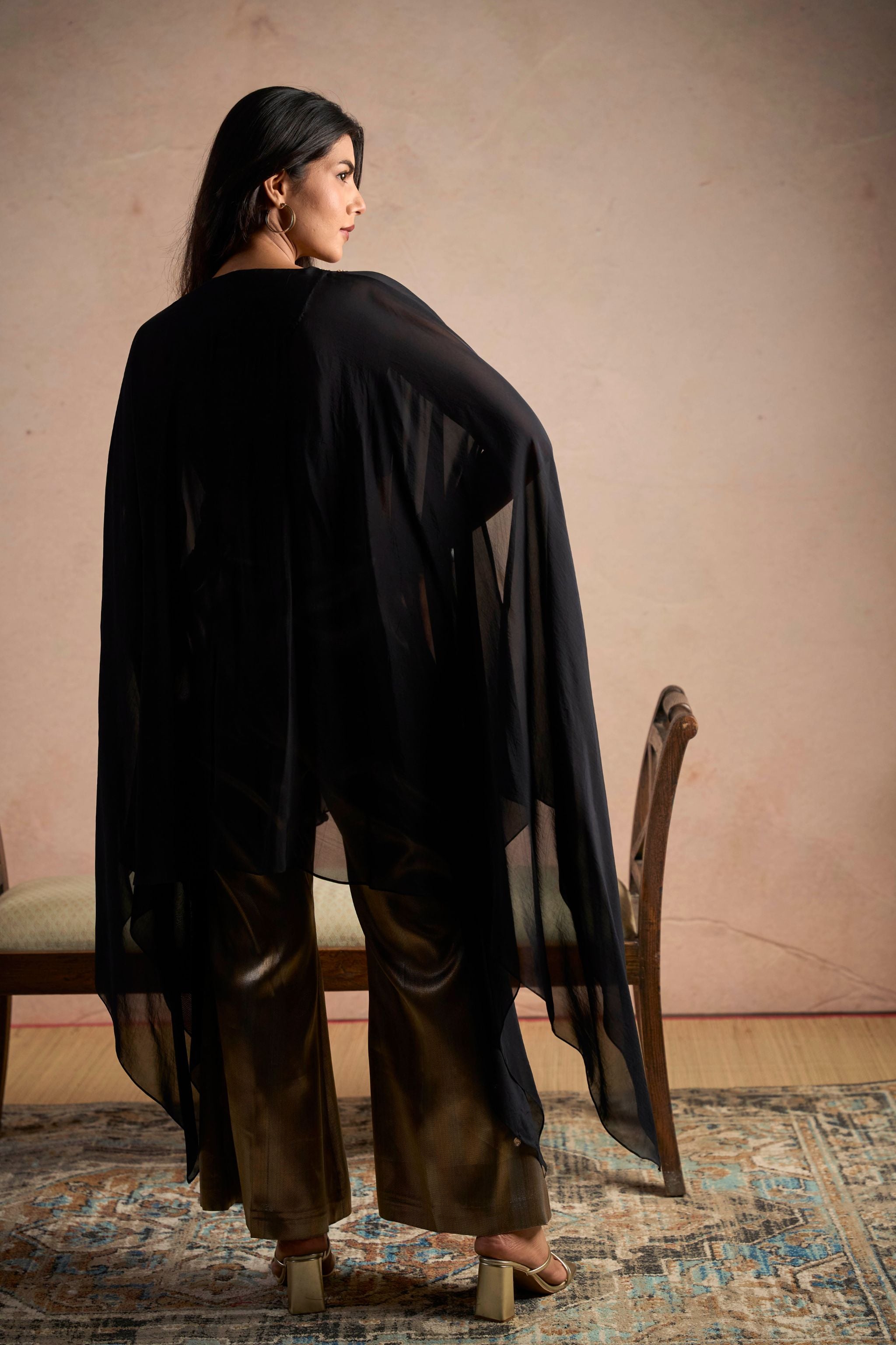 Black Embellished Cape Top & Gold Wide-Leg Pants