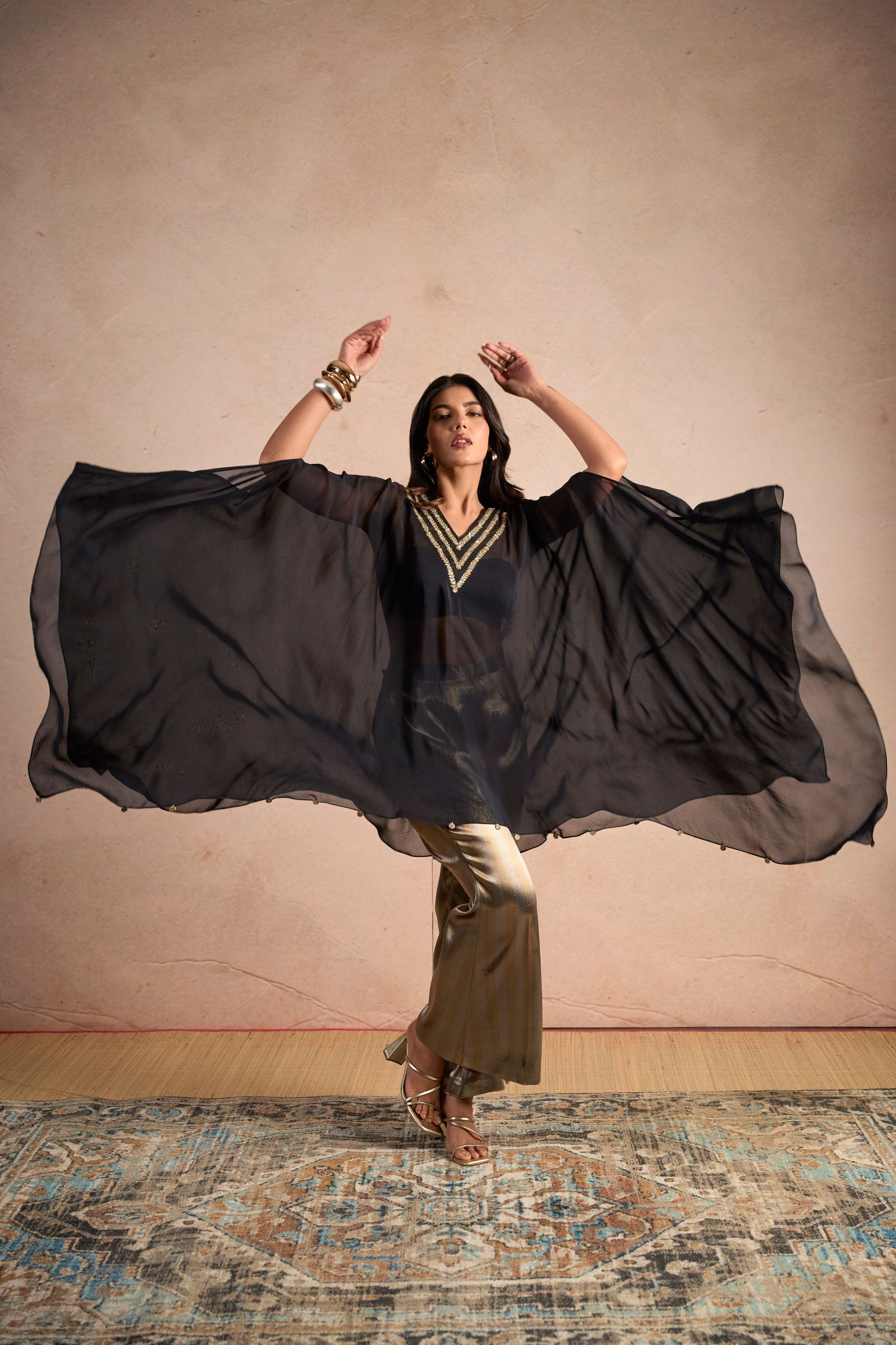 Black Embellished Cape Top & Gold Wide-Leg Pants